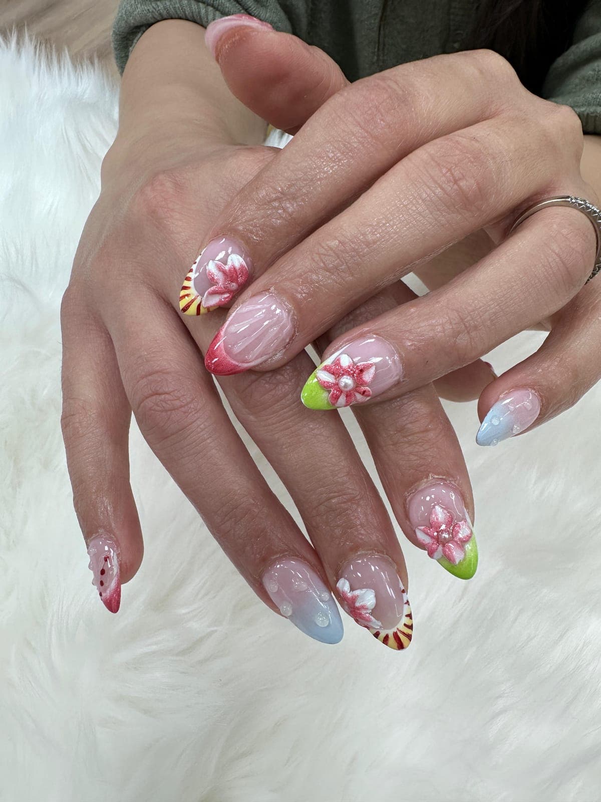 Pastel almond nails with 3D flowers