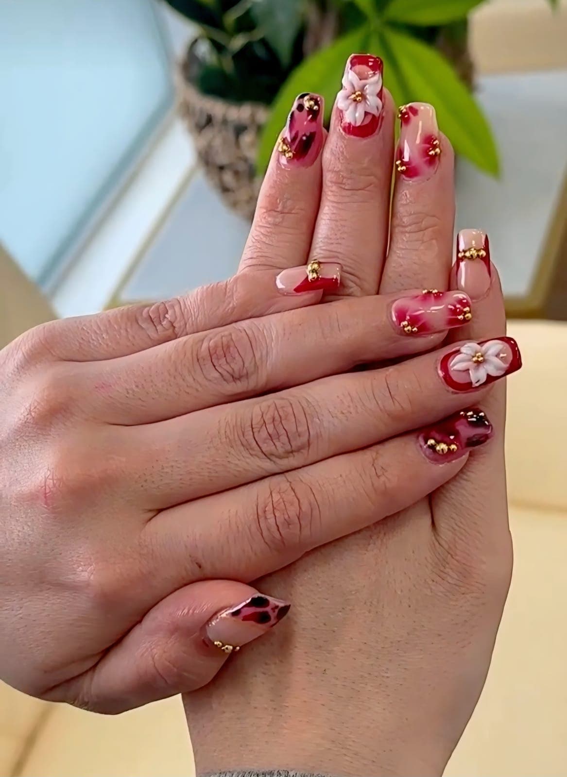 Red and sheer nails with 3D flowers